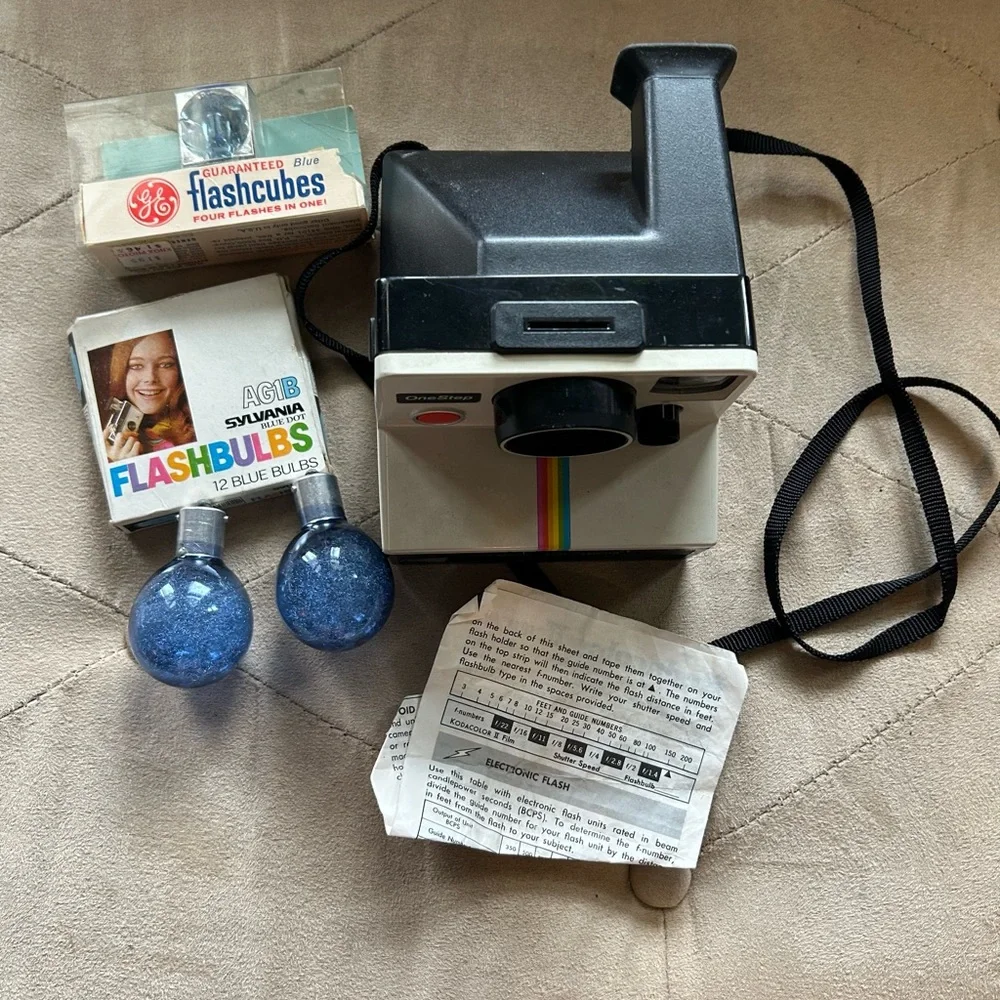 Vintage Polaroid One Step Instant Camera with accessories